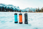 Liberty water bottles in a snowy mountainside