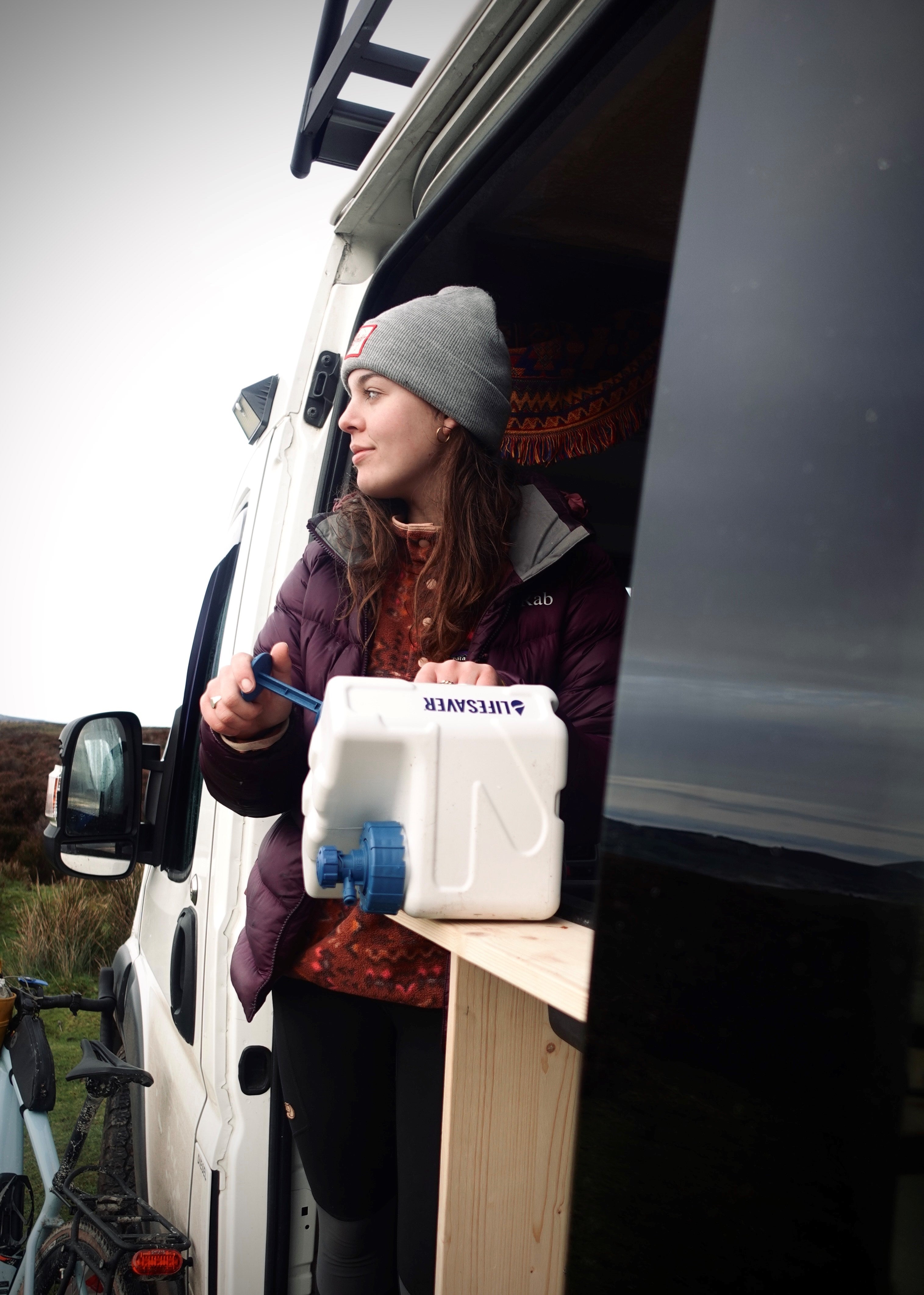 Person using a LifeSaver Cube in a van 